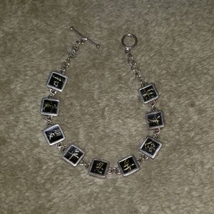 Silver look chinese symbols bracelet